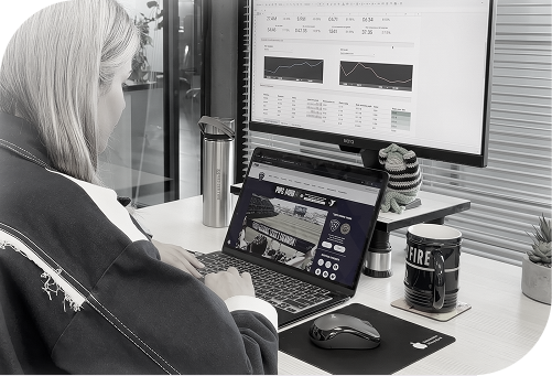 Person working on laptop at desk